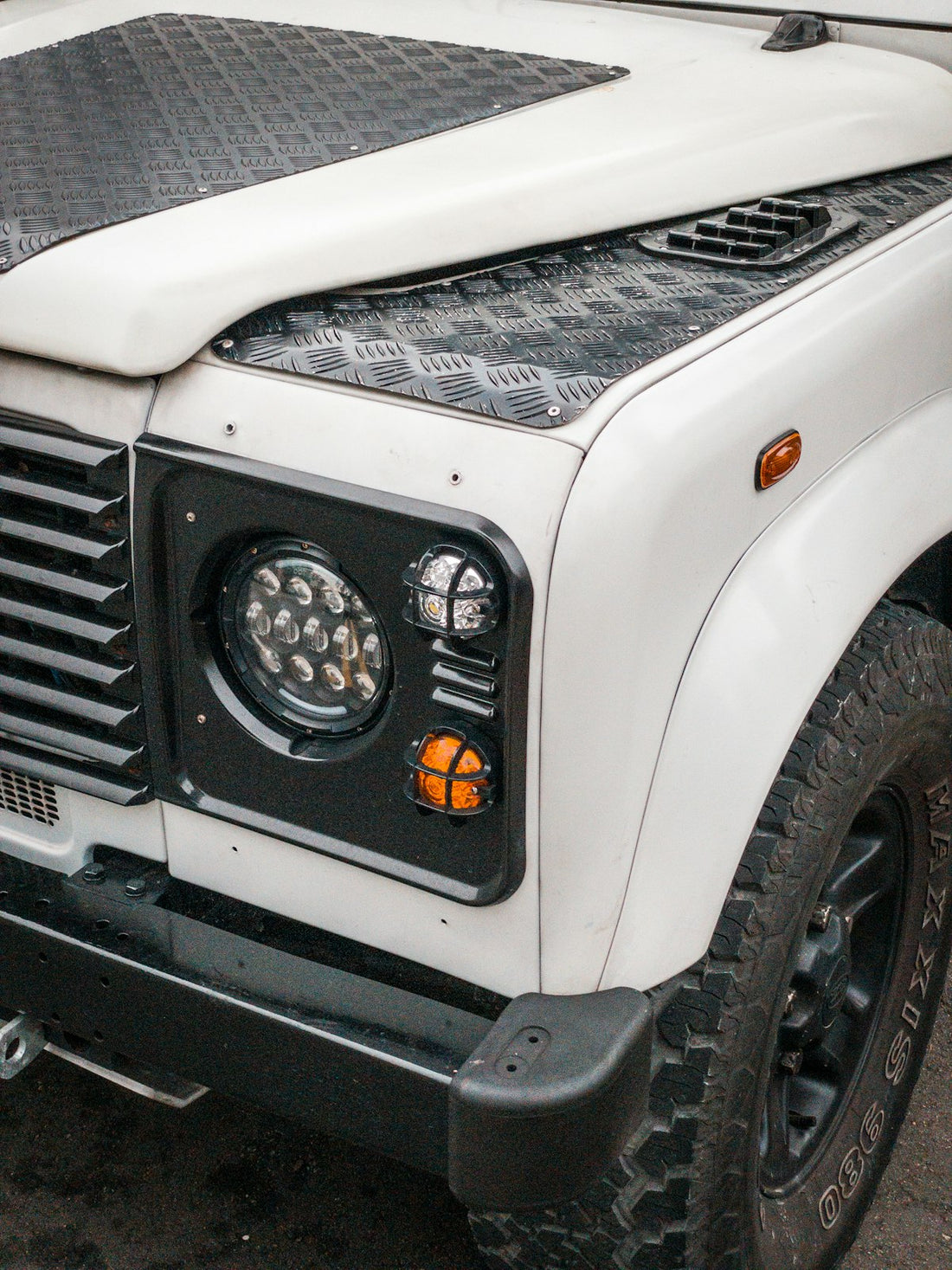 Rear view of a Jeep Wrangler showing the spare tire mounted on the back