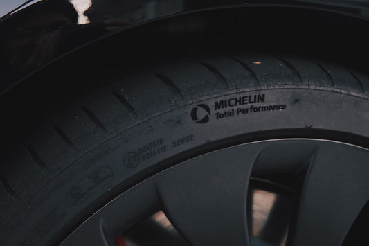 Close up of a spare tire sidewall showing tire size code